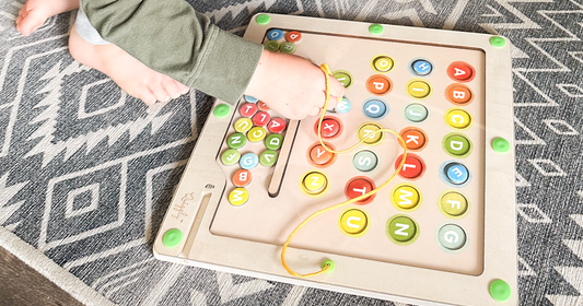 Magnetic alphabet maze with all capital letters and simple colors from Quiggly