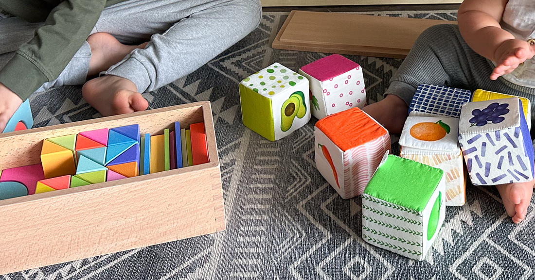 Children playing with simple wooden and soft fabric toys in a calm room