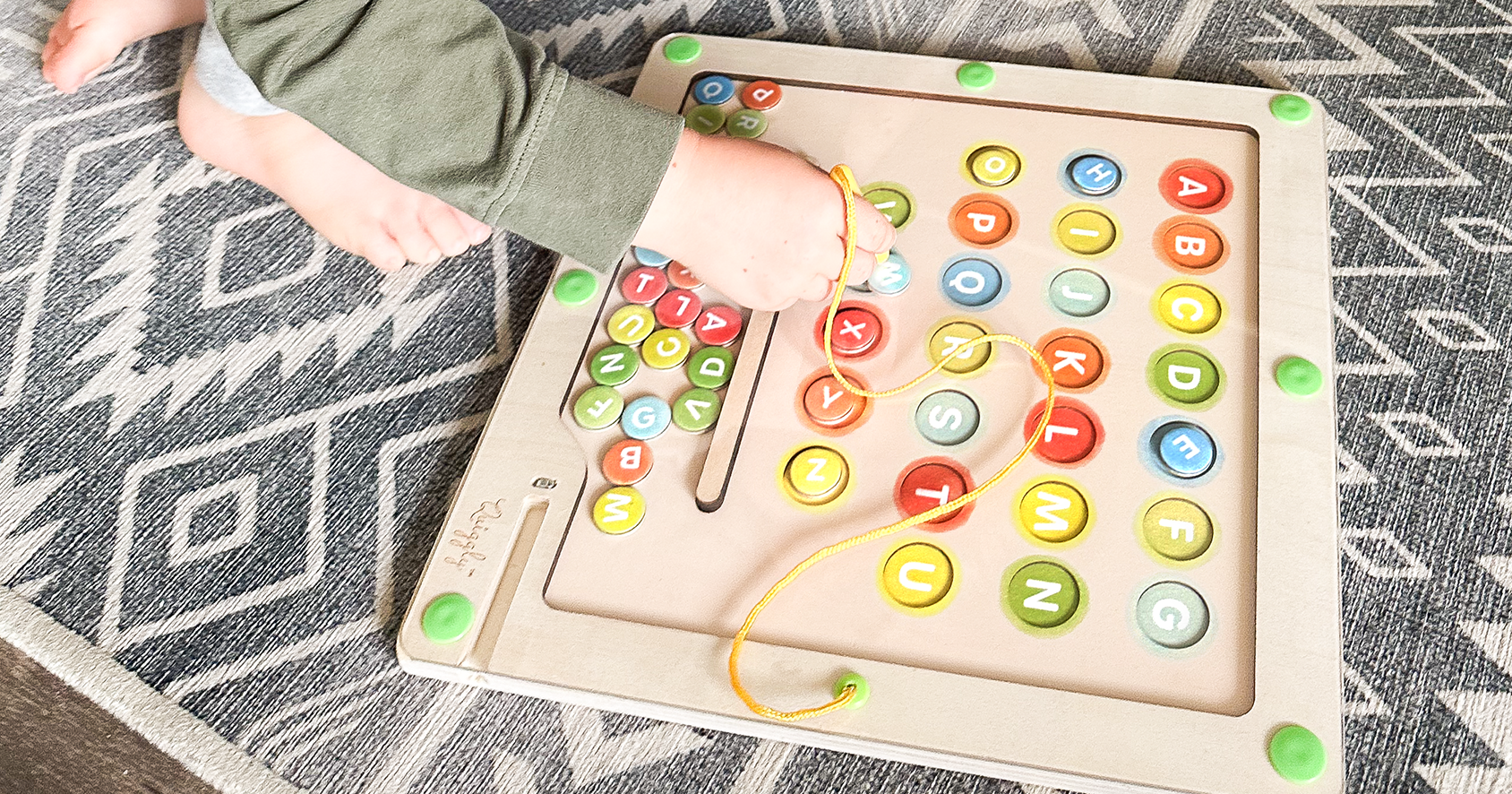 Magnetic alphabet maze with all capital letters and simple colors from Quiggly